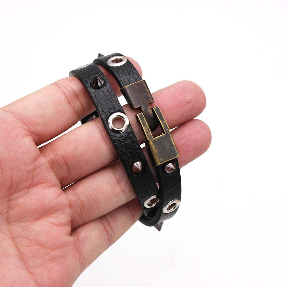 Bold rivet design PU leather bracelet – perfect for dominant fashion and fetish wear.